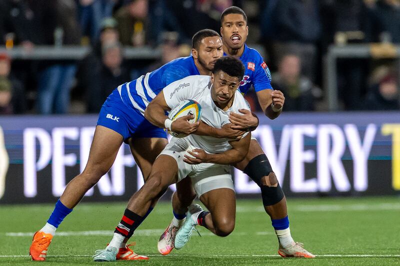 Ulster’s Rob Baloucoune with Suleiman Hartzenberg and Ben Loader of DHL Stormers. Photograph: Morgan Treacy/Inpho