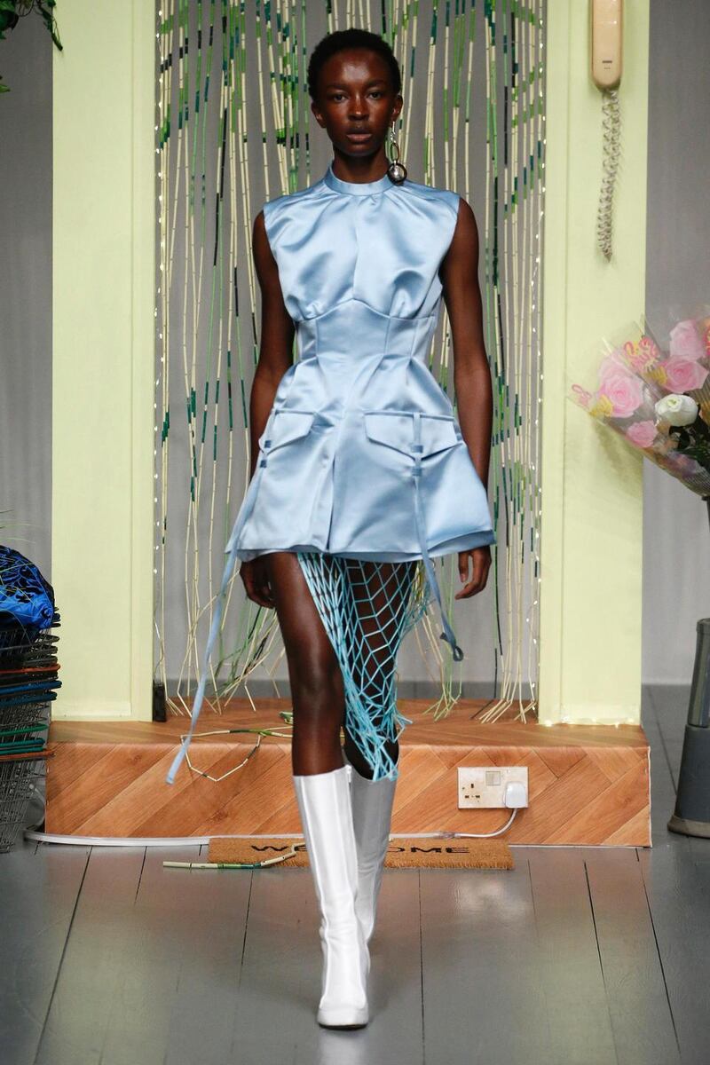 Into the blue with Richard Malone using tailored luxury duchesse satin with a flourish of fringing.