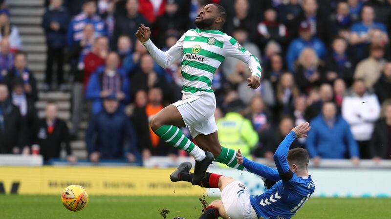Olivier Ntcham (left) is tackled by Andrew Halliday. Photo: Andrew Milligan/PA Wire