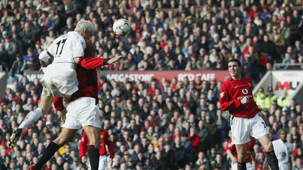 Manchester United’s John O’Shea looks on as Alan Smith scores the Leeds equaliser during the sides’ last Premier League meeting in February 2004. The game at Old Trafford finished 1-1. Photograph: Getty Images
