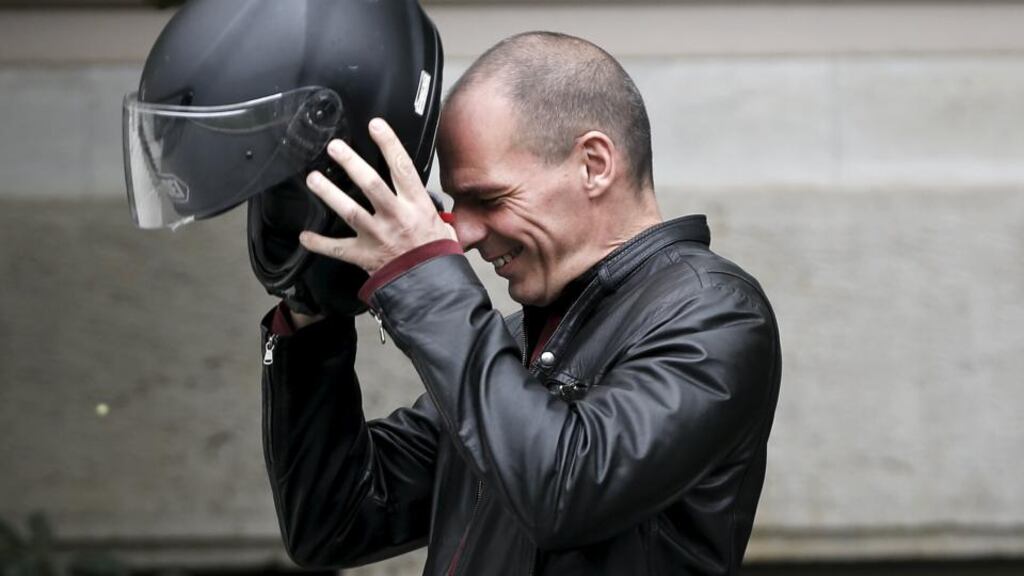 Greece’s finance minister, Yanis Varoufakis, prepares to leave the Maximos Mansion in Athens on his motorbike yesterday after a meeting with prime minister Alexis Tsipras. Photograph: Alkis Konstantinidis/Reuters