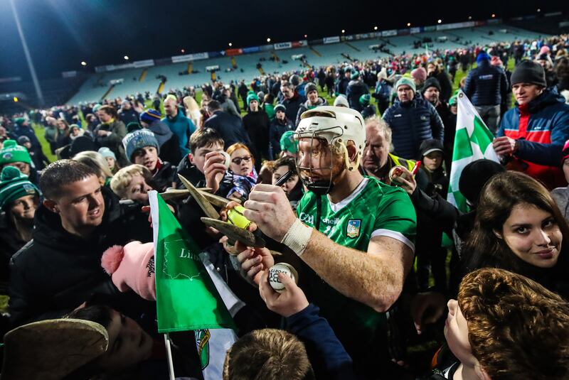 Limerick's Cian Lynch signs autographs after the game. Photograph: Evan Treacy/Inpho