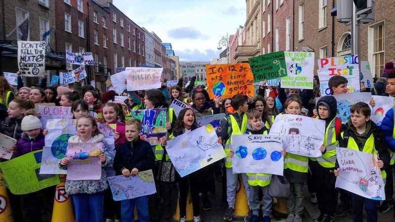 Schoolchildren protesting near Leinster House in Dublin, calling on the Government to take action on climate change. Photograph: Nell Mercier/PA Wire