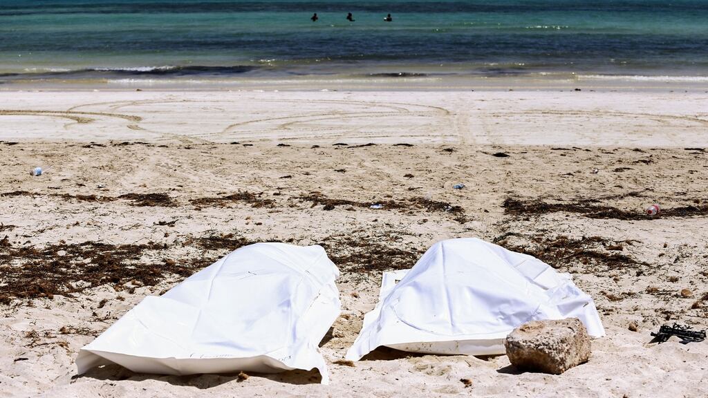 Recovered bodies on the beach of Aghir in Tunisia’s southern island of Djerba from a boat carrying 86 migrants that capsized off the Tunisian coast while crossing the Mediterranean from Libya to Italy in July. Photograph: Anis Mili/AFP via Getty Images