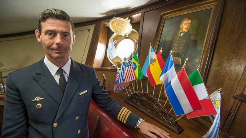 Ignacio Martin Errecaborde, Captain Commanding Officer Tall Ship Frigate A.R.A Libertad with a portrait of Admiral William Brown, in Dublin. Photograph: Dara Mac Donaill / The Irish Times
