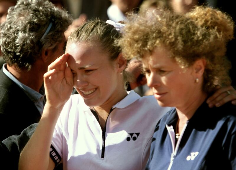 Martina Hingis of Switzerland cries with her mother Melanie Molitor after losing to Germany's Steffi Graf in the French Open women's singles final at Roland Garros on June 5th, 1999. Photograph: Thomas Coex/AFP