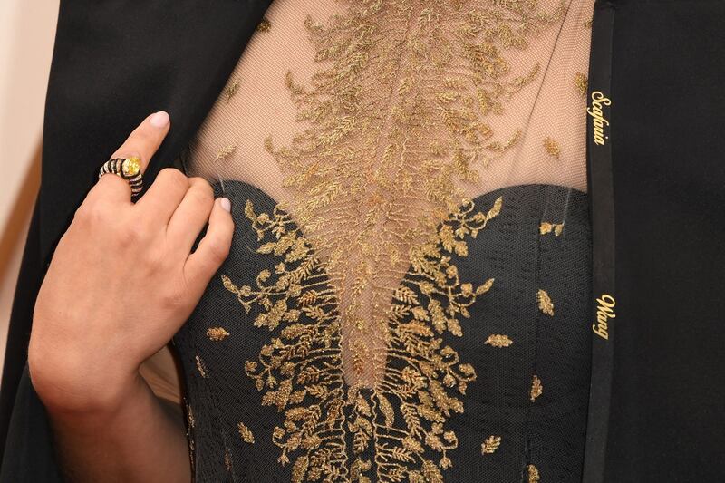 A close-up of the cape worn by Natalie Portman at the Oscars. Photograph: Robyn Beck/AFP via Getty