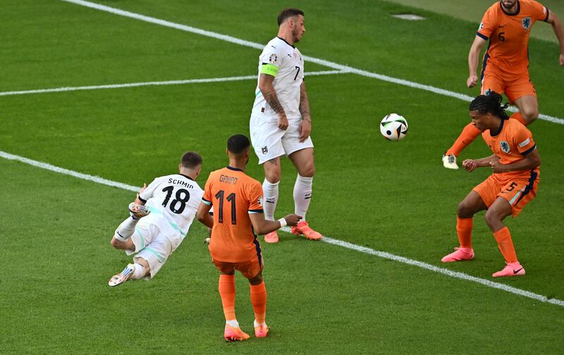 Romano Schmid of Austria scores his team's second goal. Photograph: Dan Mullan/Getty Images