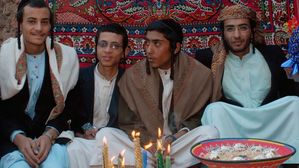 Yemeni Jews Yussef Saeed Hamdi (right), poses with unidentified guests on the first day of his traditional wedding party in the village of Raydah in Amran province, 70km north of Sanaa, in this 2008 photo. Photograph: Khaled Fazaa/AFP/Getty Images