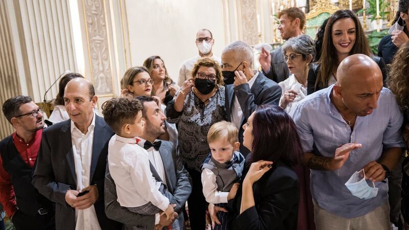 Family gathered for Samuel’s baptism this month at the church of Santa Maria della Salute. Photograph: Gianni Cipriano/The New York Times