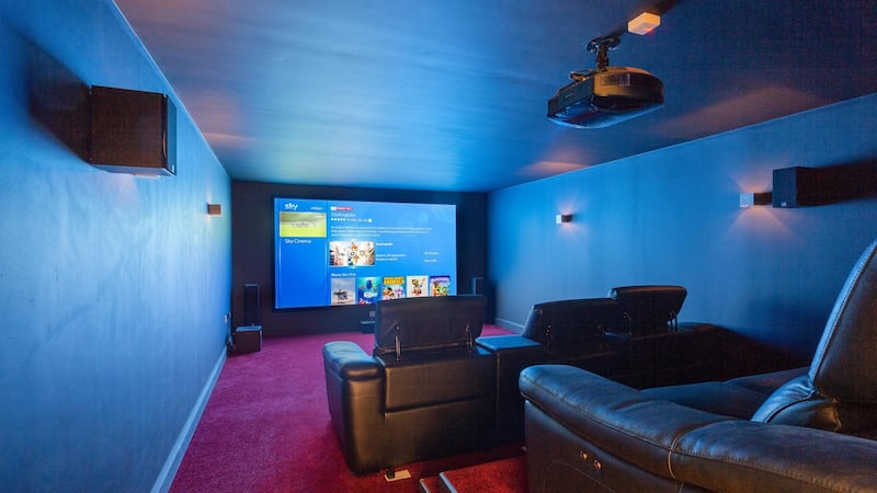 Main attraction: the home cinema room with a state of the art surround sound system and  mammoth 12ft screen