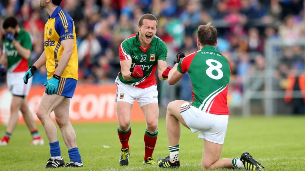 Mayo’s Andy Moran and Aidan O’Shea celebrate the final whistle in the Connacht semi-final. Photograph: James Crombie / Inpho
