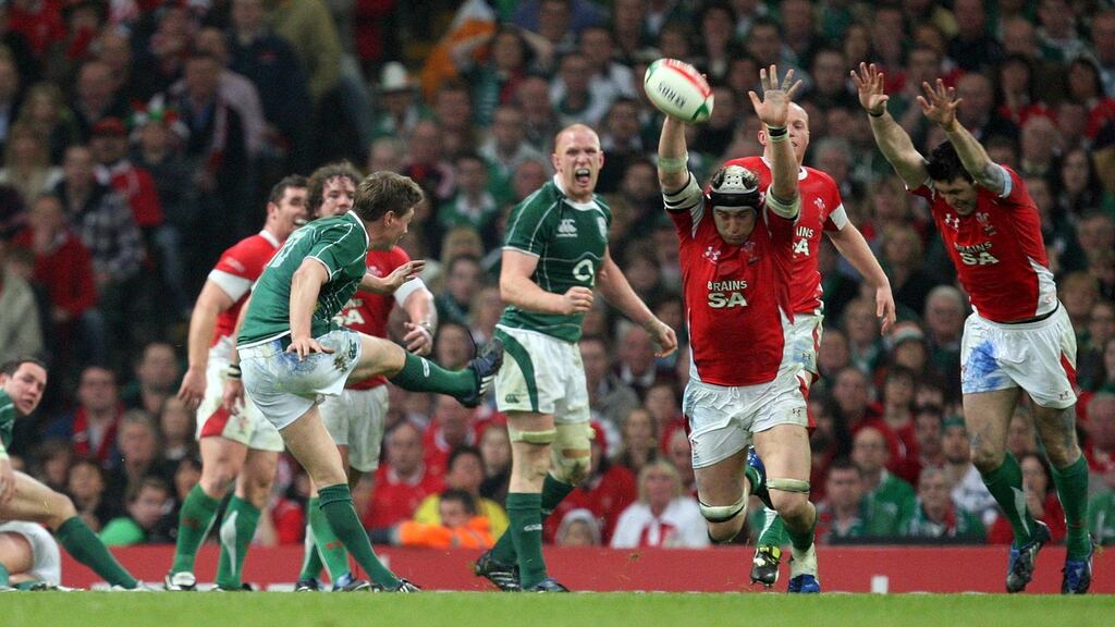 Ireland’s Ronan O’Gara scores a drop goal in the dying minutes against Wales to secure the 2009 Six Nations title for Ireland. Photo: Dan Sheridan/Inpho