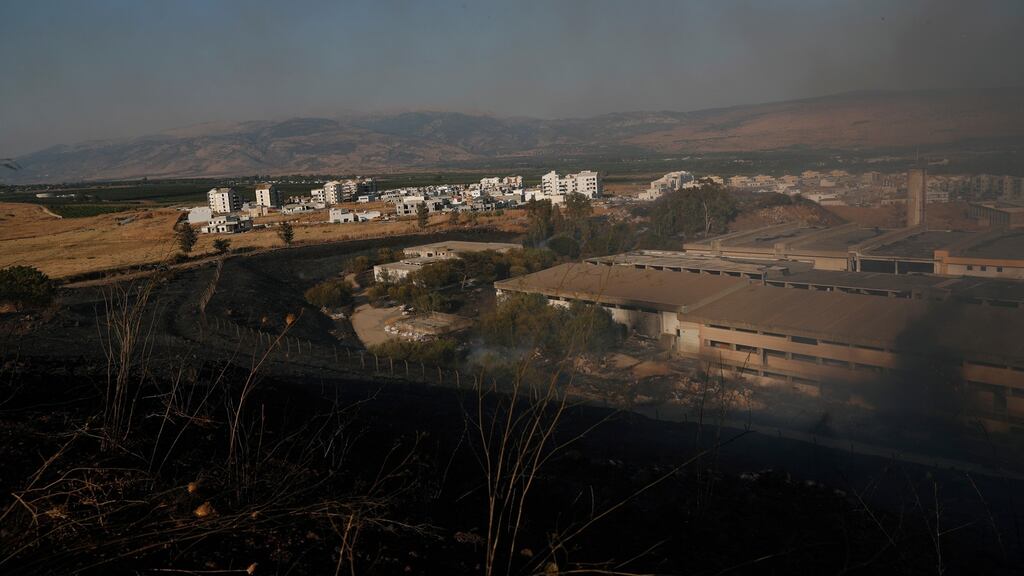 Smoke rises as a result of a rocket launched from Lebanon toward the northern Israeli town of Kiryat Shemona. Israeli army spokesperson report that three rockets were fired from Lebanon into Israeli territory. Two of them fell in Israeli territory, one of which did not cross into Israeli territory. In response, Israeli Artillery fired into Lebanese territory. Photograph: Atef Safadi/EPA