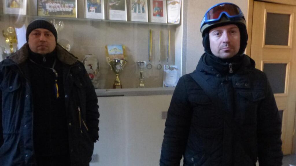 Oleksandr Danylyuk (right) in Ukraine’s agriculture ministry, which he and fellow opposition activists seized yesterday.