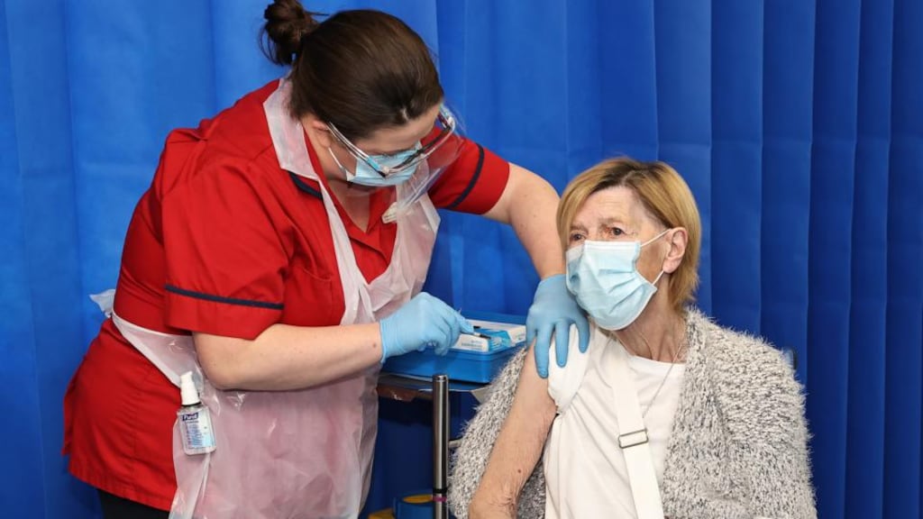 Clinical nurse manager Deborah Cross gives Annie Lynch the Covid-19 vaccination at St James’s Hospital in Dublin 8. The 79-year-old Dublin grandmother was the first person in the Republic to receive the vaccine. Photograph: Marc O’Sullivan