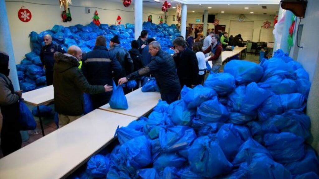 Sorting Christmas food parcels at the Capuchin Centre in Dublin on Thursday. Photograph: Nick Bradshaw