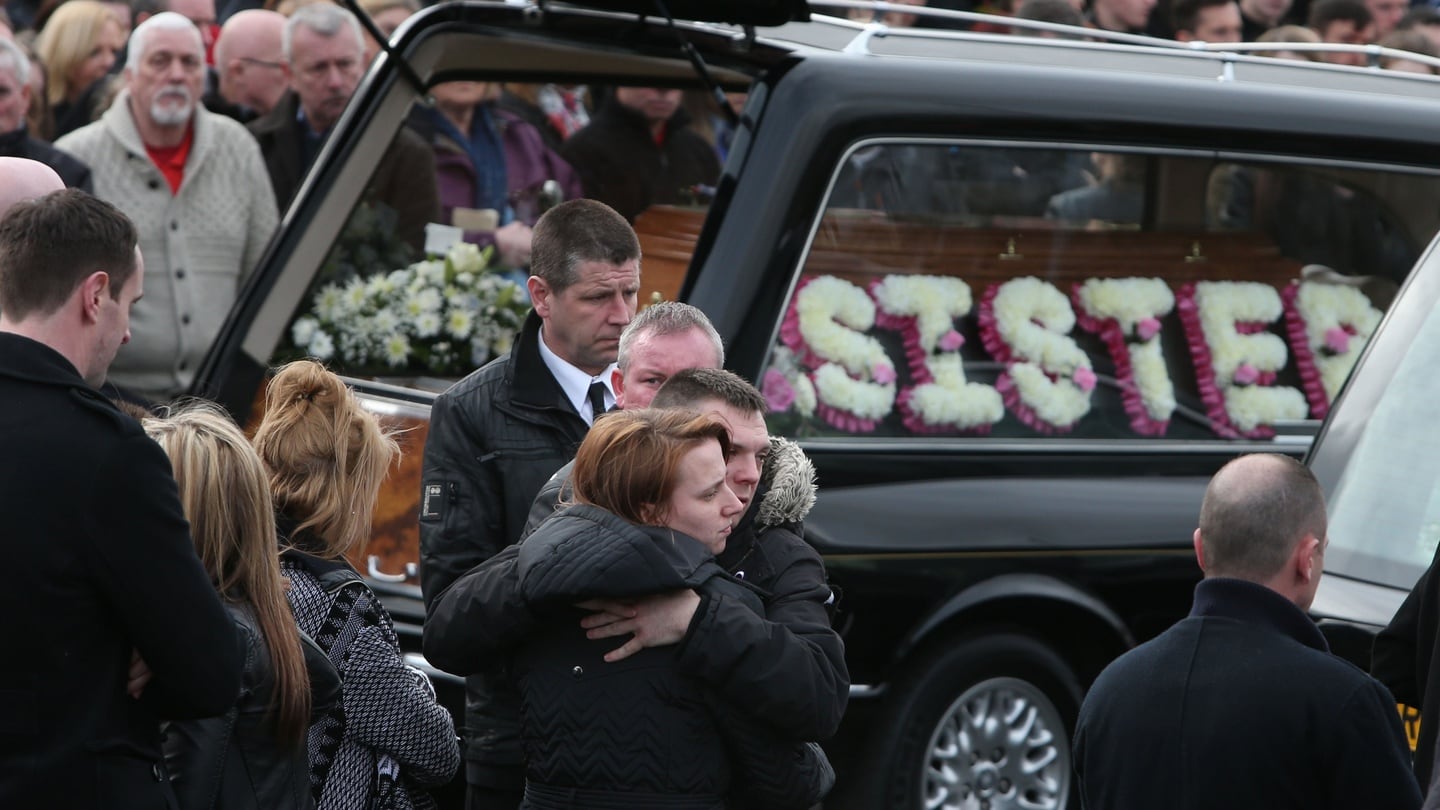 Mourners outside the Holy Family church, Ballymagroarty, Derry, after the funeral of the five people who were killed when their car slid off a slipway in Buncrana, Co Donegal. Photograph: Brian Lawless/PA Wire