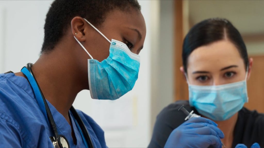 Dr. Ruha Wame Makhura, intern in Galway University Hospital, learns how to perform an arterial blood gas on a high fidelity simulator under the watchful eye of Ms. Bronwyn Reid McDermott, senior simulation technician, NUI Galway and The Irish Centre for Applied Patient Safety and Simulation.