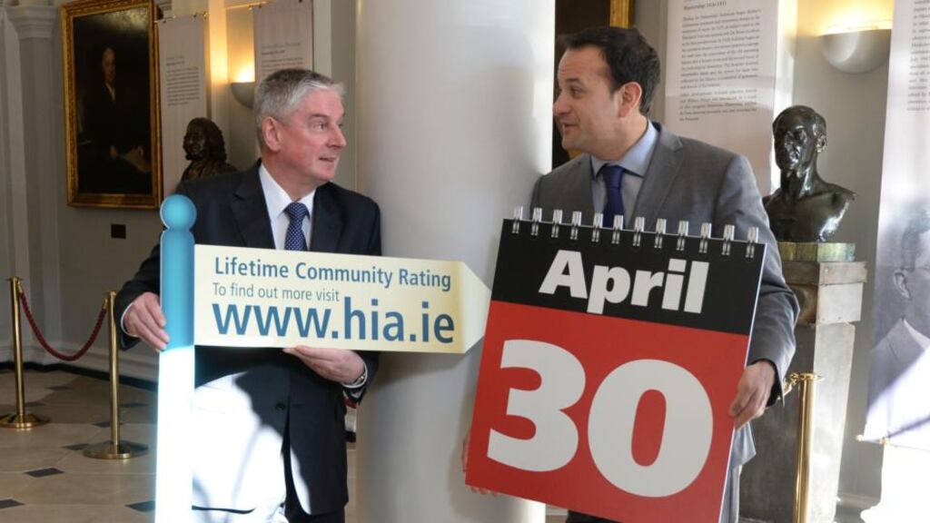 Don Gallagher, chief executive of the Health Insurance Authority, with MInister for Health Leo Varadkar. Photograph: Dara Mac Dónaill / The Irish Times.
