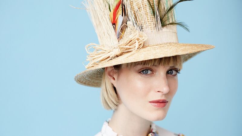 Bird’s nest straw topper, €280; white floral print blouse, €38, Limited at M&S