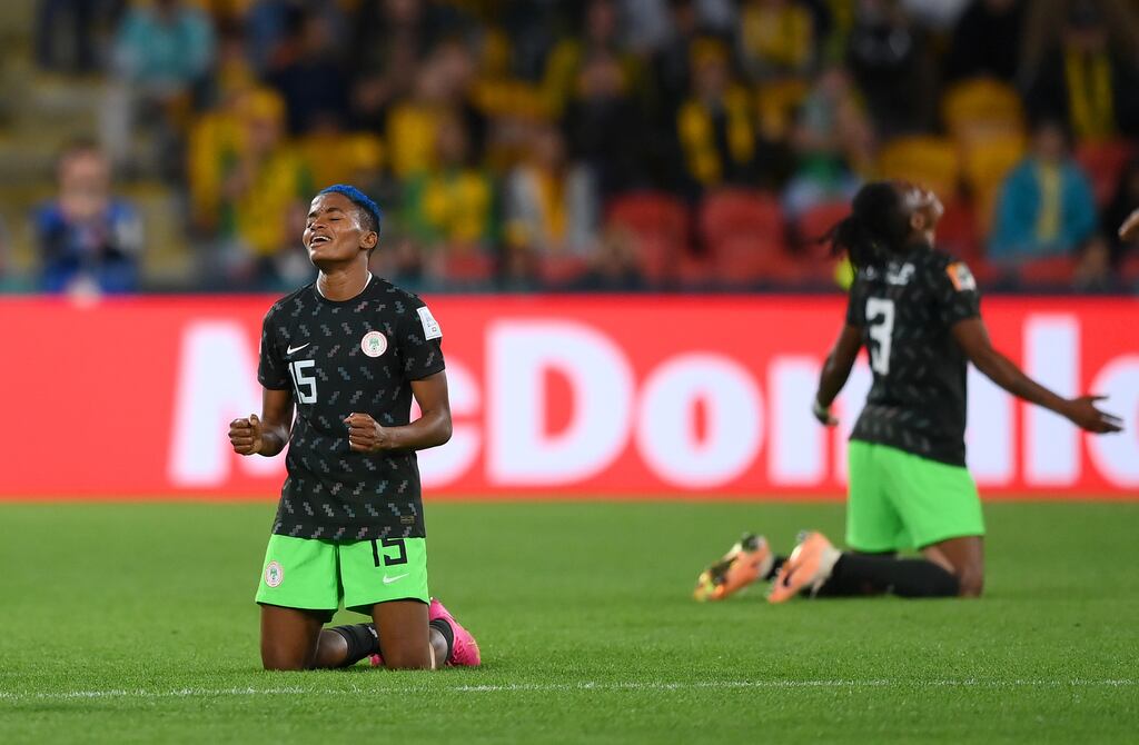 Rasheedat Ajibade and Osinachi Ohale of Nigeria celebrate the team's 3-2 victory. Photograph: Justin Setterfield/Getty Images