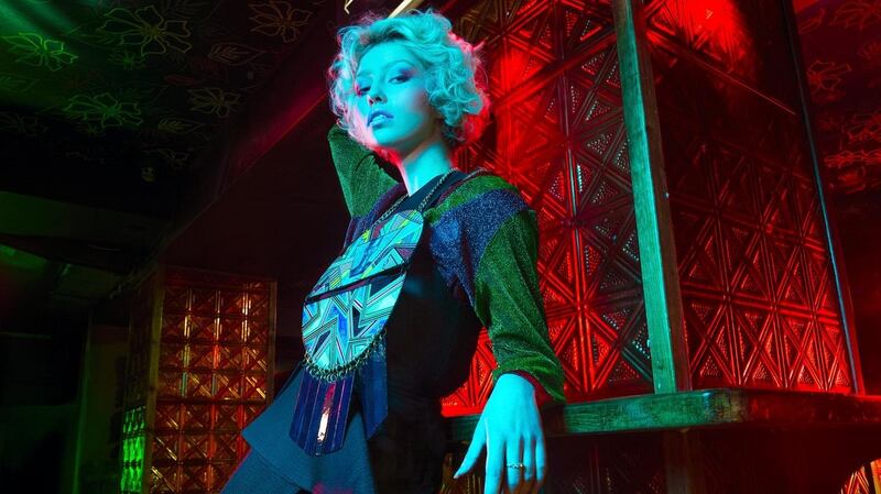 Lurex chevron top (€110), black dress (€249) both from Moda Mallow, Cork. Grace Jones graphic print neckpiece (€265) Kiki Na Art