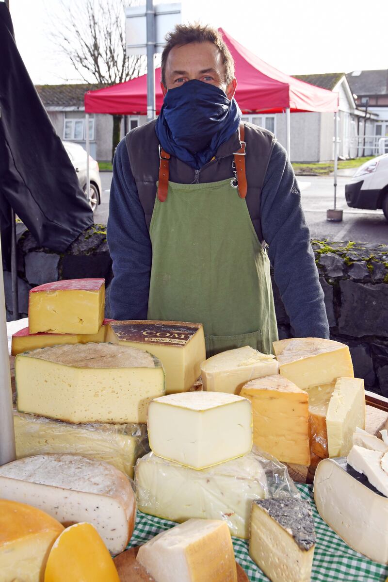 Chris Gwos at his Strawbale Cheese stall at Midleton Farmers' Market, Co Cork, where you'll also find the likes of Emye Ethiopian Food. Photograph: Denis Minihane