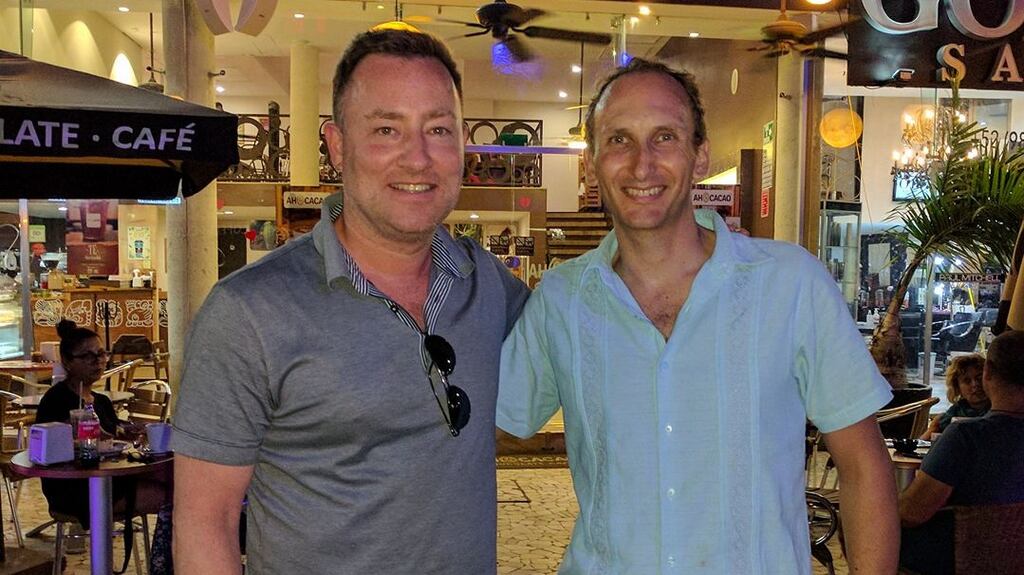 Rohan Barnett (left) with an MBA colleague in front of an Ah Cacao store in Playa del Carmen