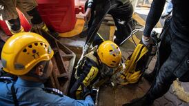 Scores of protesters holed up in tense siege at Hong Kong university