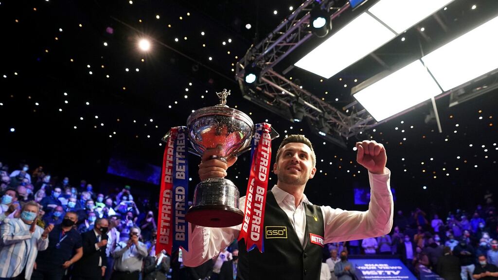 England’s Mark Selby parades his trophy after winning the the World Snooker Championships 2021 at The Crucible, Sheffield. Photo: Zac Goodwin/PA Wire
