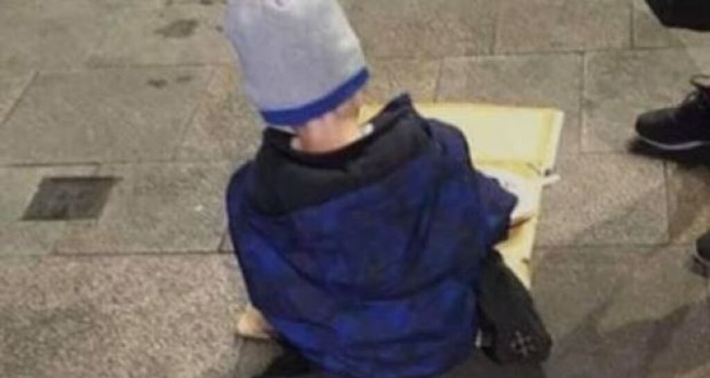 A photo of “Sam” (5) shown eating his dinner from a sheet of cardboard on a Dublin street this week in a case that was subsequently raised in the Dáil. Photograph: Homeless Street Cafe/Facebook