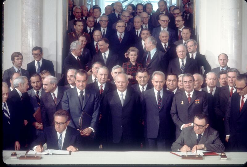 US president Richard Nixon and Soviet Union leader Leonid Brezhnev watch as US national security adviser Henry Kissinger signs a treaty in the Kremlin in May 1972 freezing certain US and Soviet weapons systems. Photograph: Dirck Halstead/Liaison)