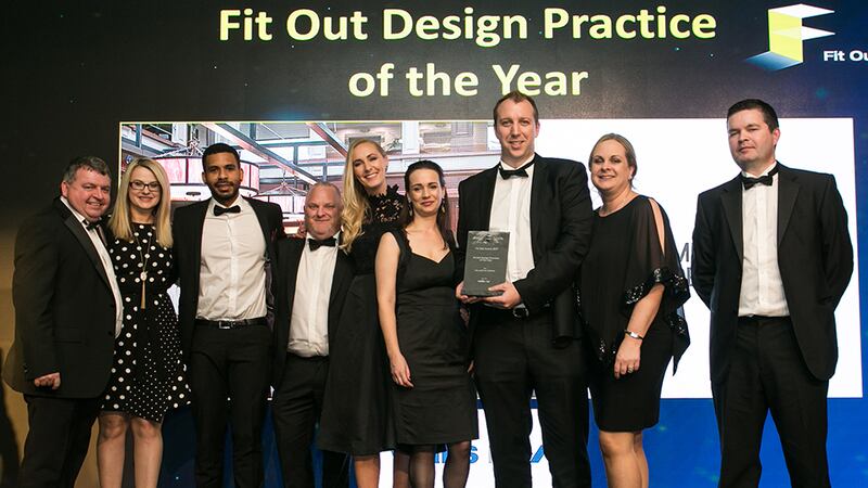 James O’Toole, Fit-out Director, Walls Construction presents the Fit Out Design Practice of the Year award to the MILLIMETRE DESIGN team