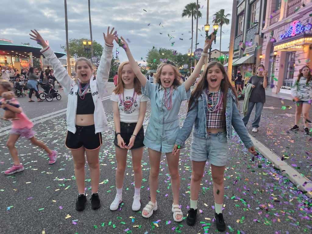 Priya Hobson, Georgia Norton, Maisy Norton and Joya Hobson at Mardi Gras in Universal Studios.