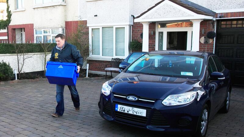 Jonathan Dowdall’s house on the Navan Road in North Dublin being searched by members of the Special Detective Unit. Photograph: Gareth Chaney/ Collins
