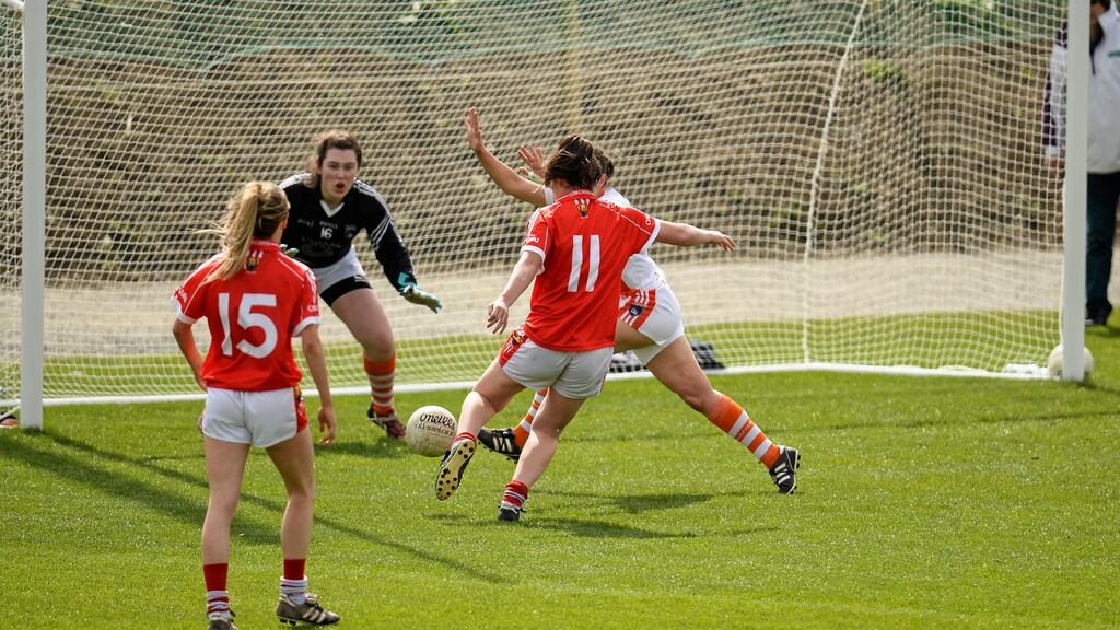 Ciara O’Sullivan, Cork, sees her shot saved by Armagh goalkeeper Katie Daly. Photo: Sportsfile