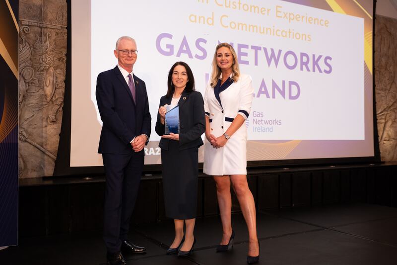 Ian Talbot, chief executive of Chambers Ireland; Kate Gannon, head of customer and communication at Gas Networks Ireland; and Anna Daly, MC of the awards. Photographer: Ruben Morrissey-Fernandez/Ruby Productions