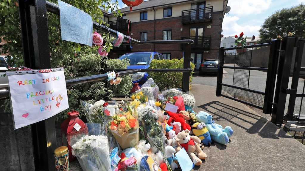 Flowers and cards placed at the entrance to the Riverside Apartments, Poddle Park, Kimmage. Photograph: Colin Keegan/Collins