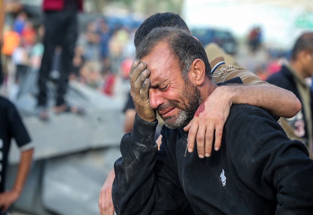 A man cries after his home was bombed during Israeli raids in the southern Gaza Strip on Monday. Photograph: Ahmad Hasaballah/Getty Images