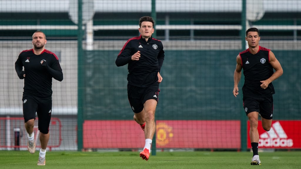 Luke Shaw, Harry Maguire, Cristiano Ronaldo of Manchester United in action during a first team training session at Carrington. Photo: Ash Donelon/Manchester United via Getty Images