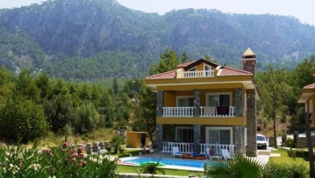 This three-bedroom stone house, in Lunigiana, north of Florence and west of Bologna, embraces a courtyard. Price: €149,000