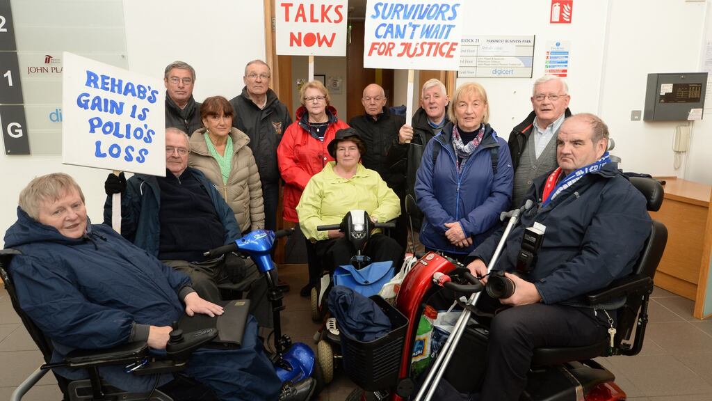 Members of the Justice for Polio Survivors campaign occupying Rehab’s Park West offices in Dublin. Photograph: Dara Mac Dónaill/The Irish Times