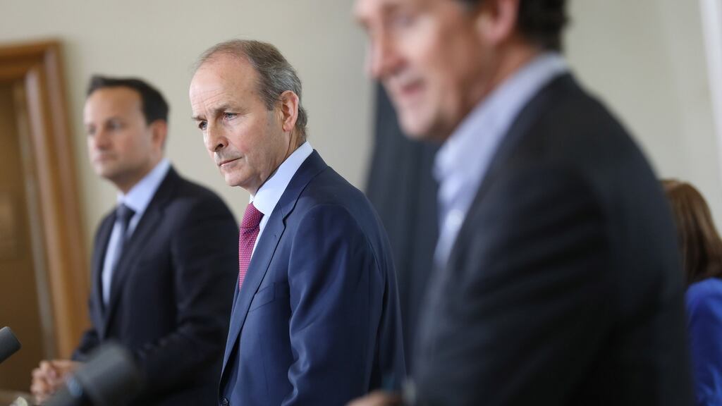 Tánaiste Leo Varadkar, Taoiseach Micheál Martin and Minister for Climate Action, Communication Networks and Transport Eamon Ryan in Dublin Castle on Monday. Photograph: Julien Behal/PA Wire