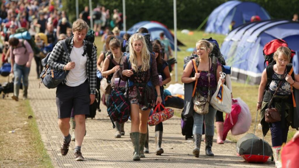 “I arrived back in Ireland after five days and nights at Glastonbury, a unique and colossal festival where nearly 200,000 people on site generally get along and are polite, friendly, and manage to have a great time without falling into the dopey traps so common at Irish outdoor shows.” Above, festivalgoers leaving the Glastonbury festival in Somerset. Photograph: Yui Mok/PA