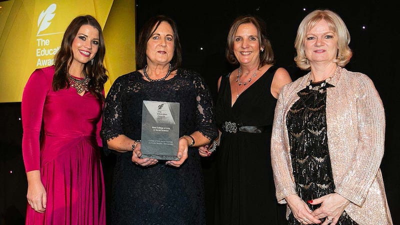 Dr Jane O'Keeffe, JC & Director of Supply Chain, NMCI/CIT presents the Best College of Arts & Social Science award to the NUI Galway Team