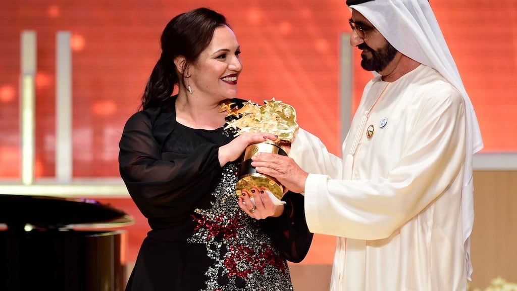 Andria Zafirakou being presented with the fourth annual Varkey Foundation Global Teacher Prize worth $1m. . Photograph: Varkey Foundation/PA Wire