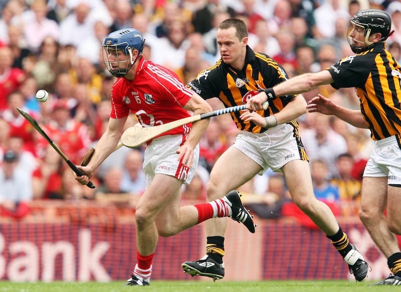 Patrick Horgan solos past Kilkenny's Michael Kavanagh during the 2008 All-Ireland semi-final. Photograph: Cathal Noonan/Inpho