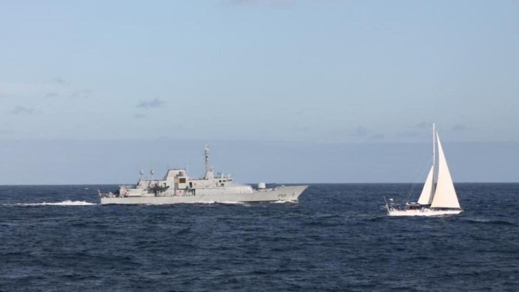 The LÉ Niamh escorting the Makayabella, which is suspected of carrying about €80 million worth of cocaine, after it was stormed by an Irish Naval team 200 nautical miles off Mizen Head on Tuesday. Photograph issued by the Defence Forces