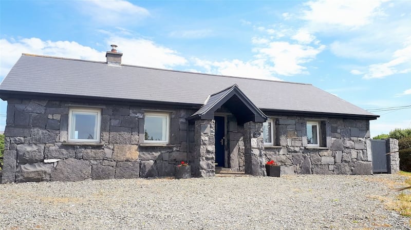 Fuschia Cottage, priced €250,000, is located within a short walk of Ballyconneely village and Connemara Golf Links